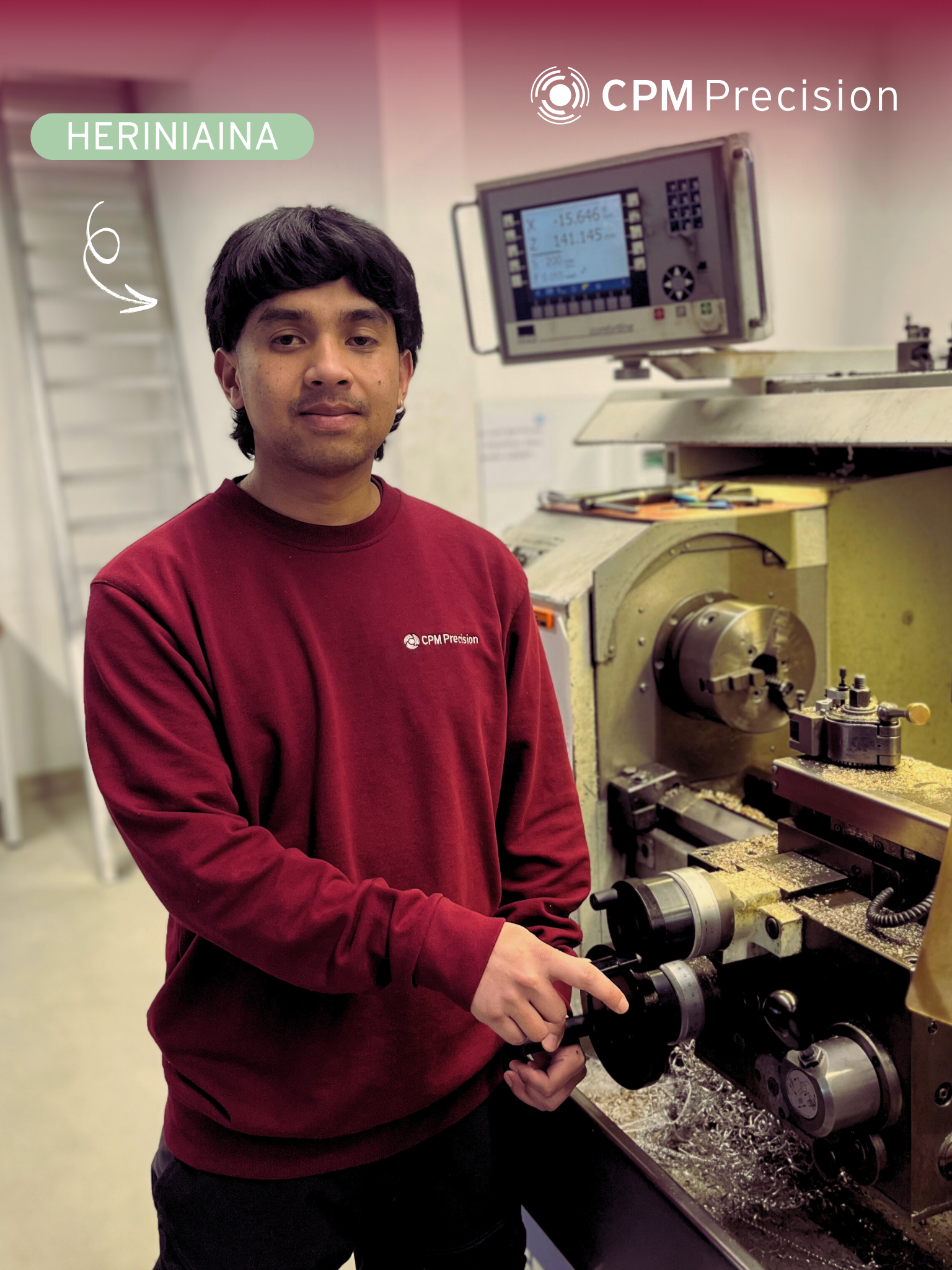 Our new apprentice at CPM Precision, Heriniaina, is standing next to a conventional lathe.